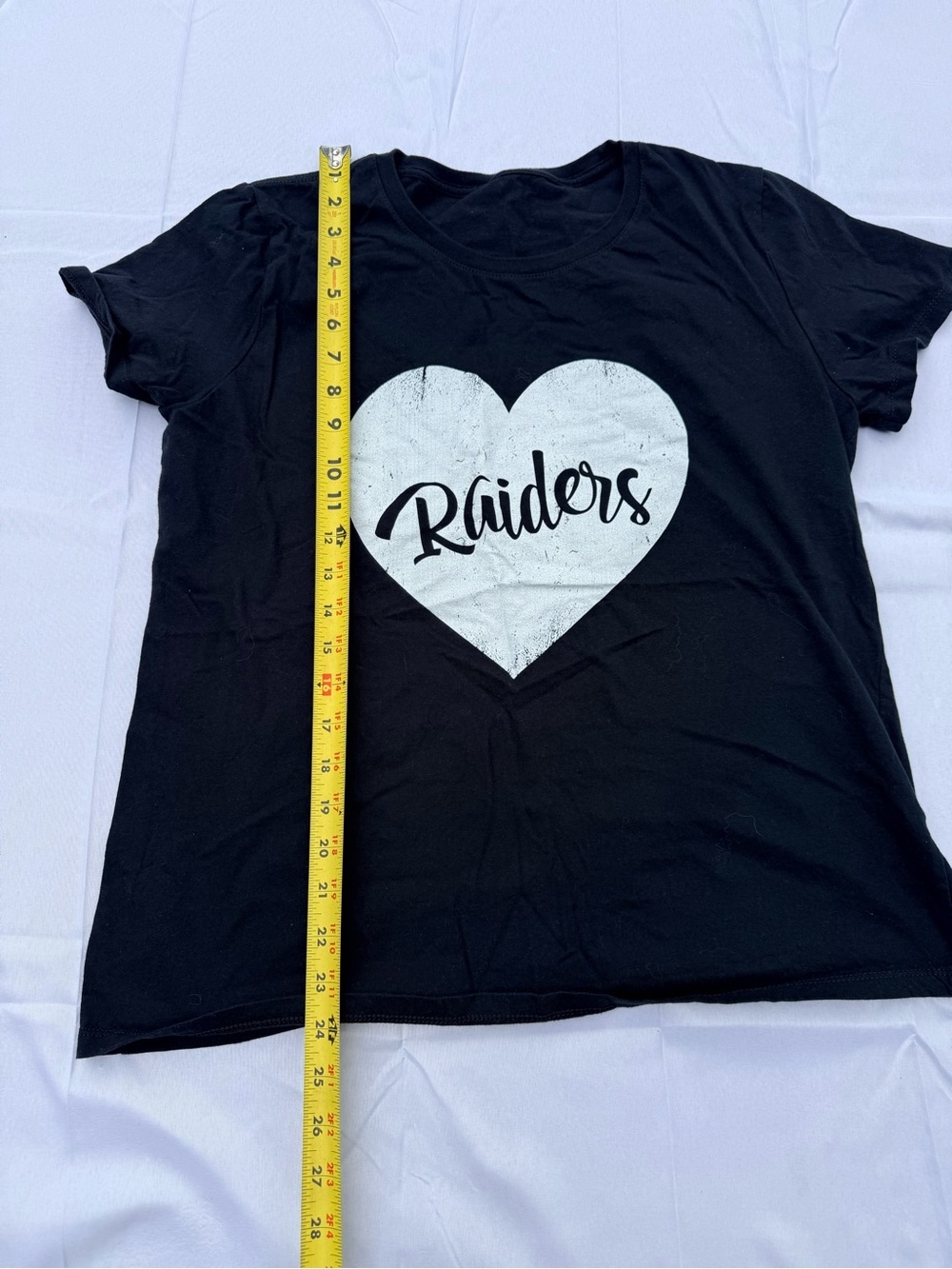 #57 size(L) Women's Black Short-Sleeve Graphic Tee with White Heart 'Raiders' - Picture 4 of 5